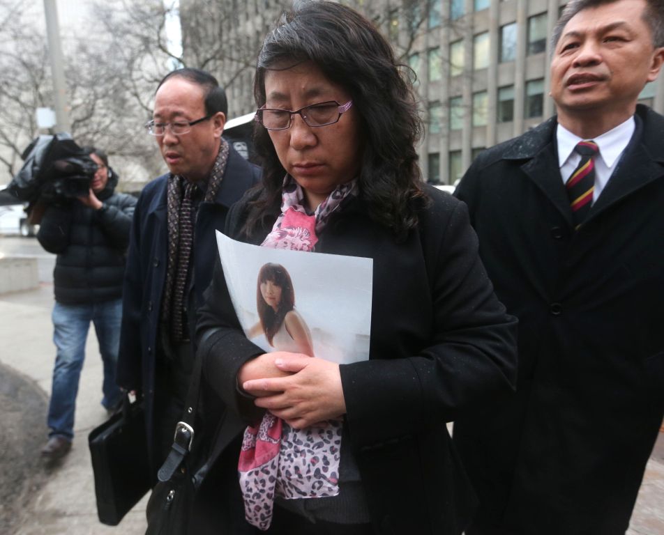Liu Jainhui and his wife ( name unknown) parents of Qian Liu (23)  outside 361 University Courthouse after the jury convicted Brain Dickson of first degree murder. Liu had been chatting via webcam with her ex-boyfriend in China, paused to answer the door